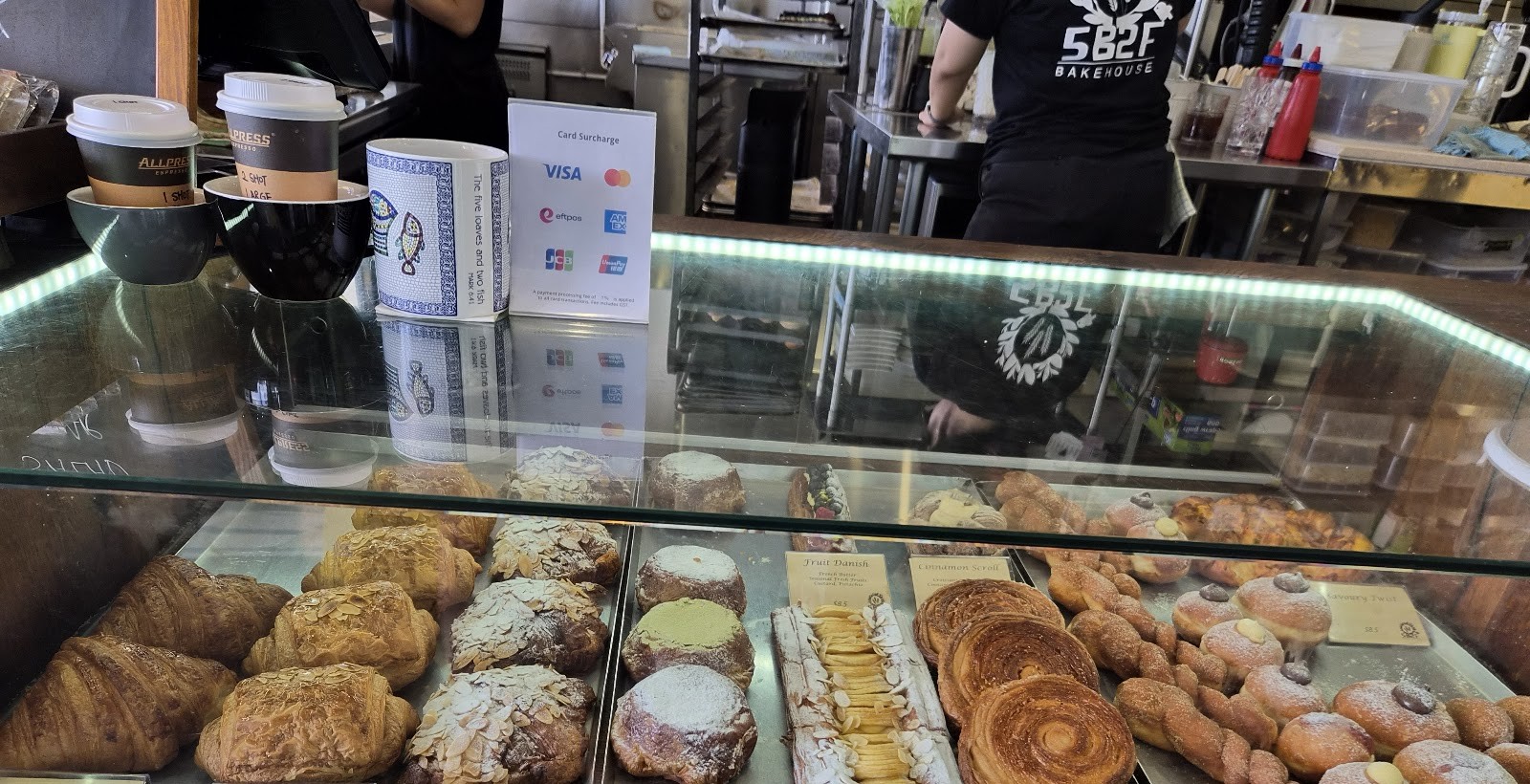 The pastry counter with croissants, almond croissants and cinnamon scrolls